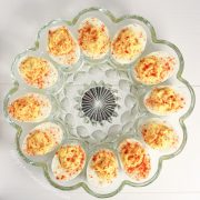 Overhead shot of deviled eggs in a circle glass platter