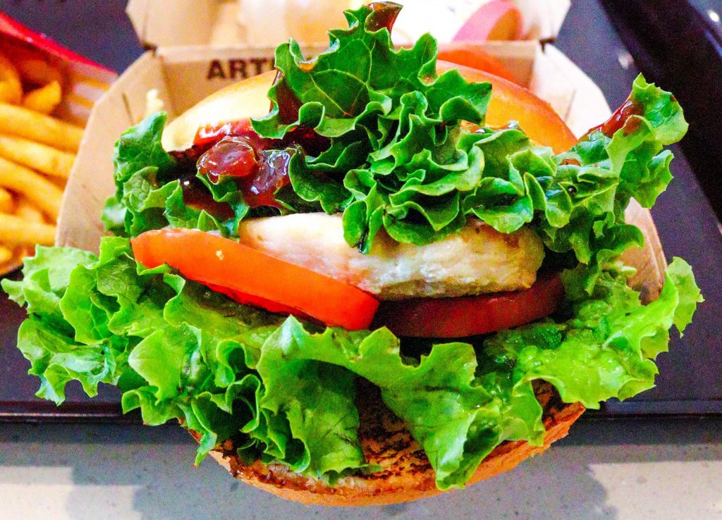 McDonald's chicken sandwich with BBQ sauce, lettuce and tomatoes