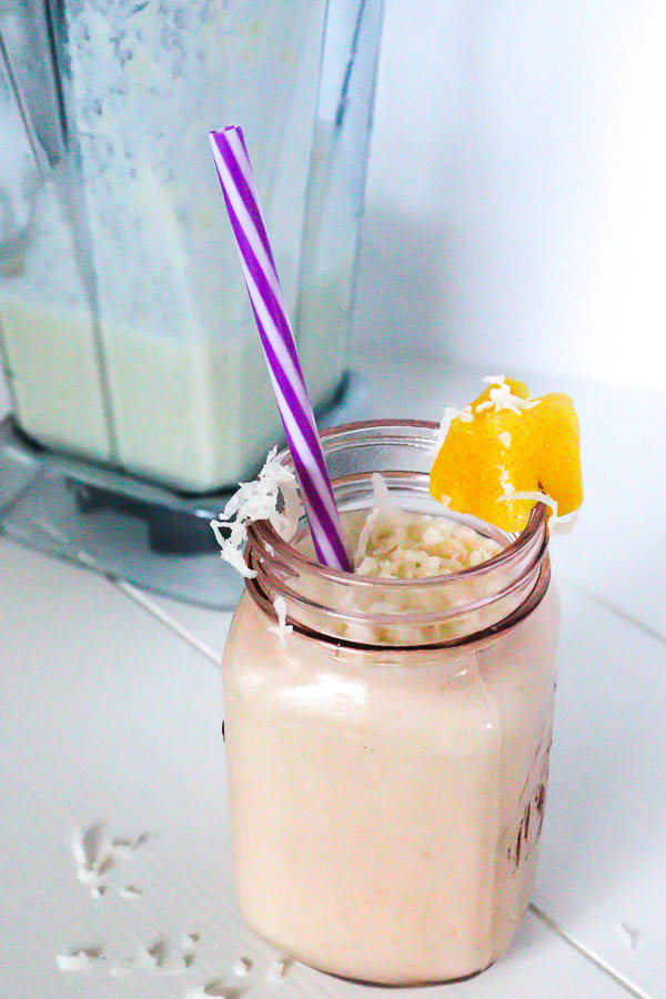 Healthy Pina Colada Chia Pudding in glass jar blended as a smoothie