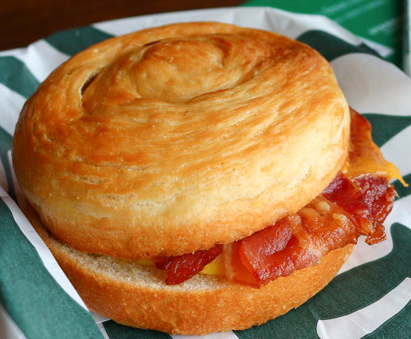 Starbucks breakfast sandwich with bacon and cheddar cheese