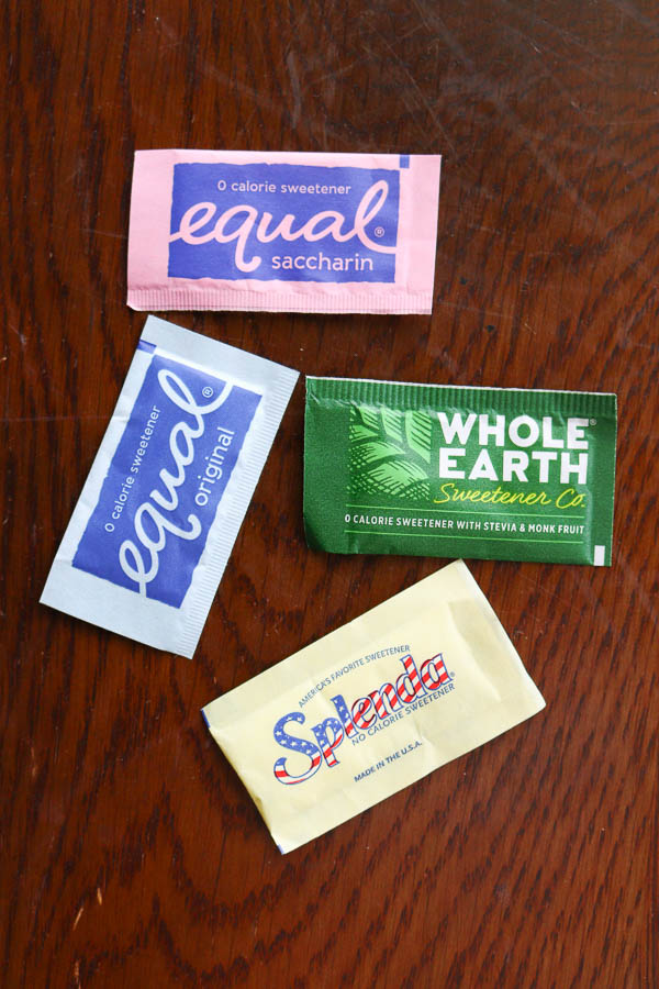 4 different sweetener packets from at starbucks