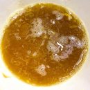 egg and honey mixed in a bowl