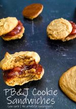 peanut-butter-and-jelly-cookie-sandwich-with-a-bite-taken-out