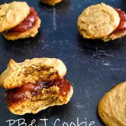 peanut-butter-and-jelly-cookie-sandwich-with-a-bite-taken-out