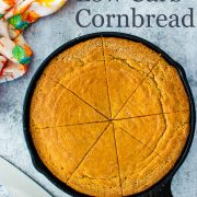 cornbread cut in a cast iron skillet.